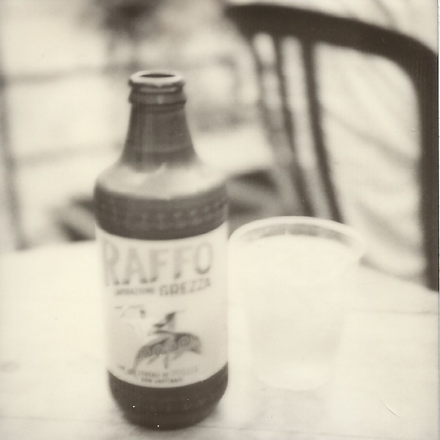 bar san callisto, trastevere rome, italy august 12, 2024 polaroid