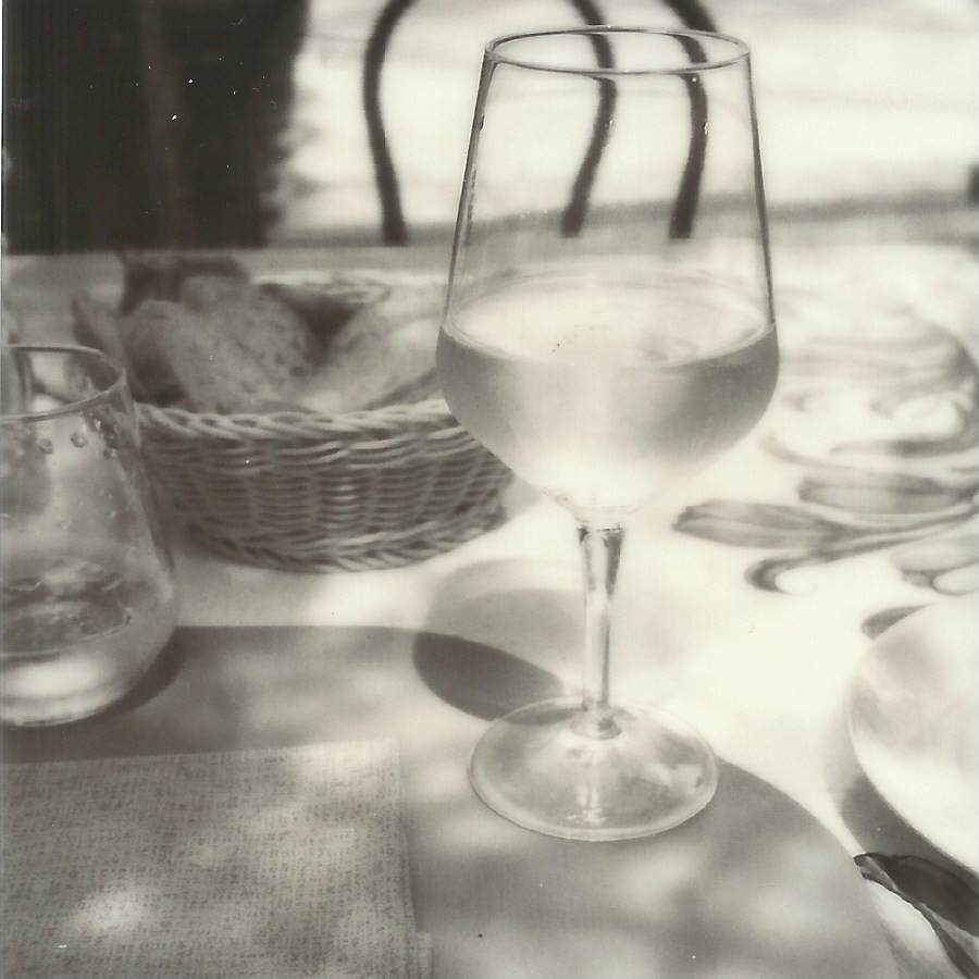 bubbles at ristorante la botte taormina, italy april 17, 2026 polaroid